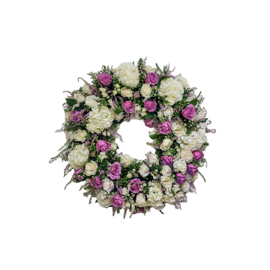 PL-08 Corona redonda de rosas, hortensias, verónicas y spray roses